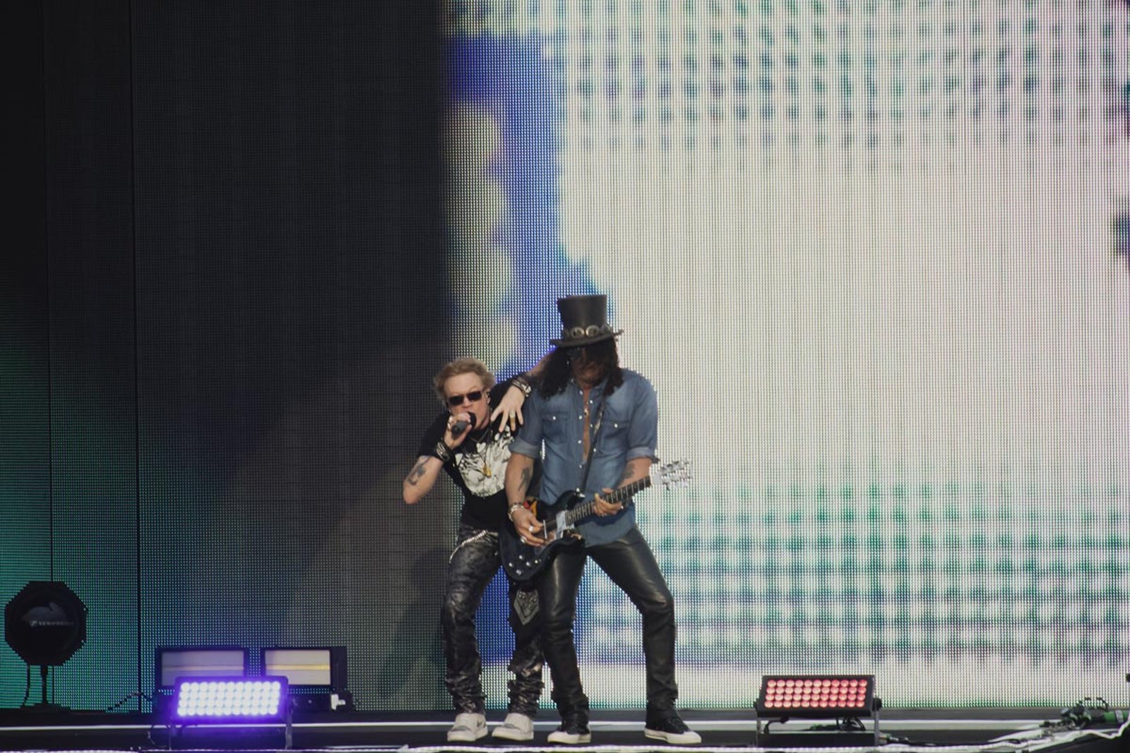 Axl Rose and Slash of Guns N Roses on stage at BST Hyde Park in London in June 2023, a video wall filling the stage behind them