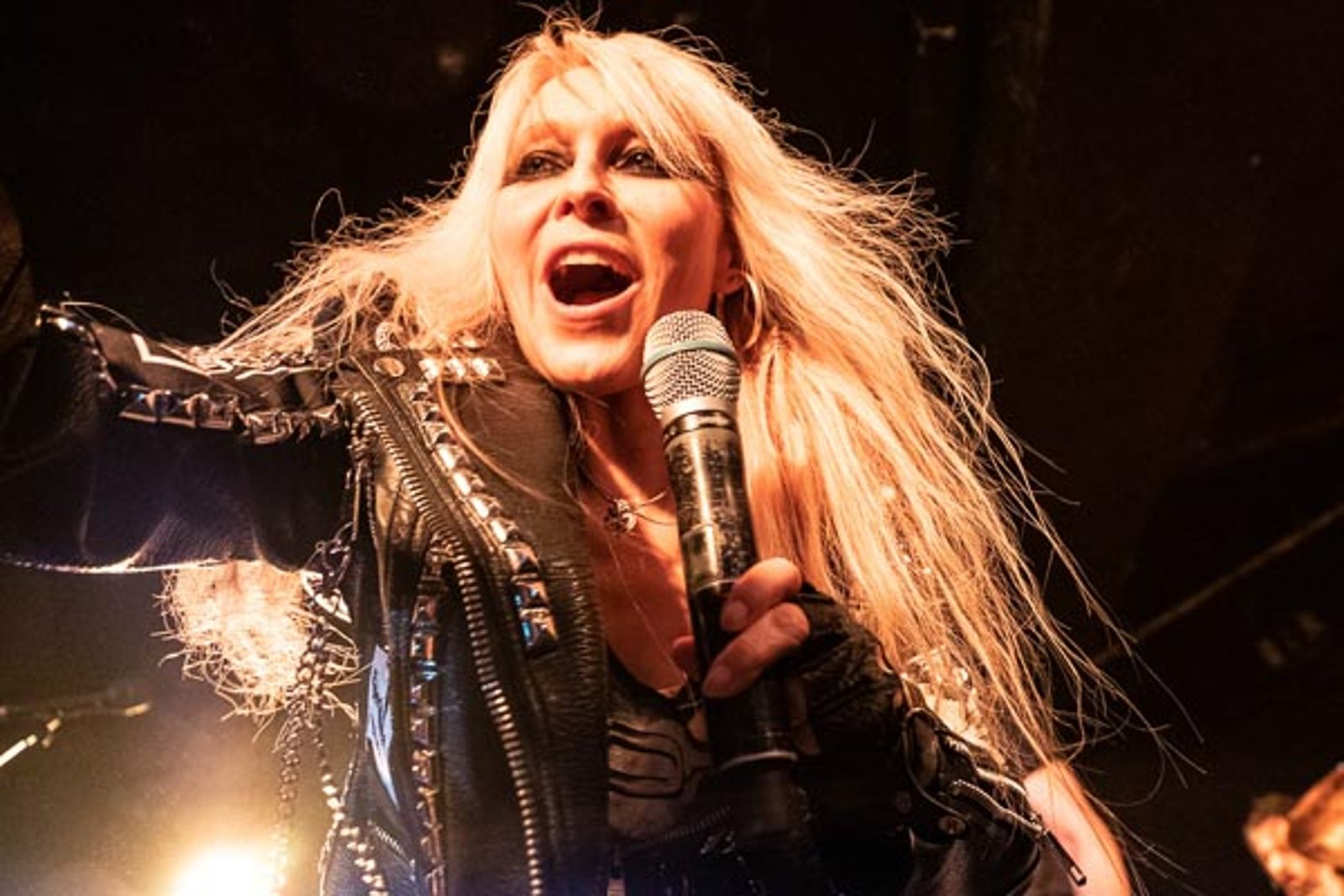 Doro Pesch singing into the microphone at the Underworld in Camden in March 2019