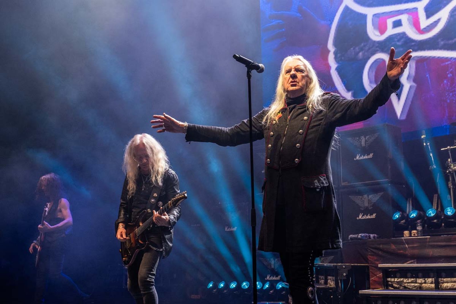 Saxon on stage at the Eventim Apollo in London in November 2025, Biff Byford at the microphone with Marshall stacks behind