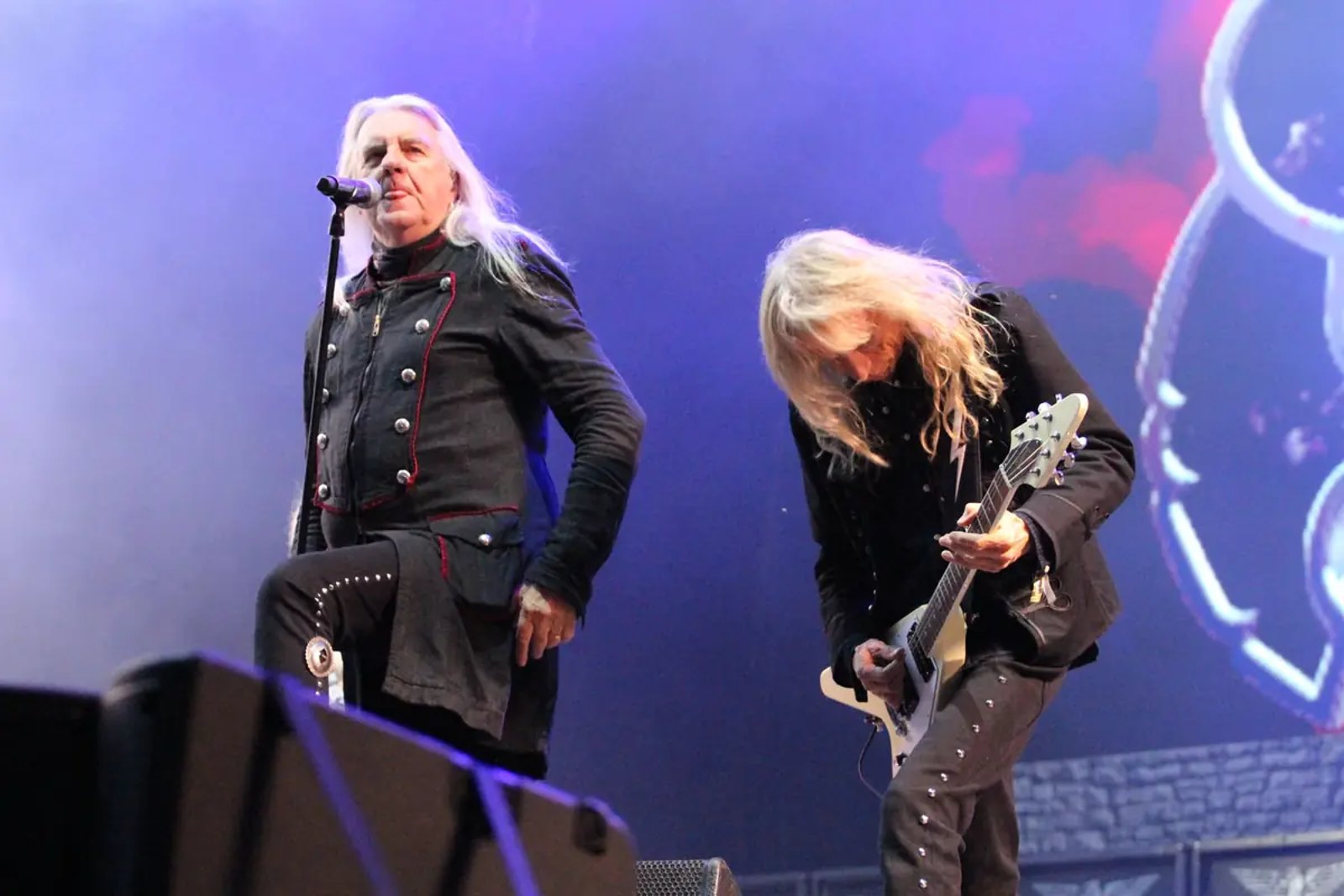 Saxon frontman Biff Byford and guitarist Doug Scarratt performing live on the main stage at Bloodstock Festival 2026.