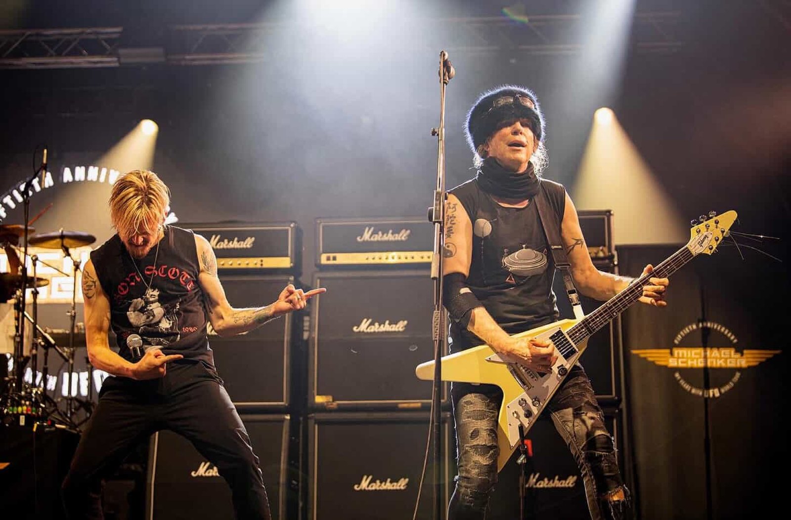 Michael Schenker playing his signature yellow Gibson Flying V beside singer Erik Gronwall on the My Years With UFO 50th-anniversary tour, Maid of Stone festival, Mote Park, Maidstone, 20 July 2025