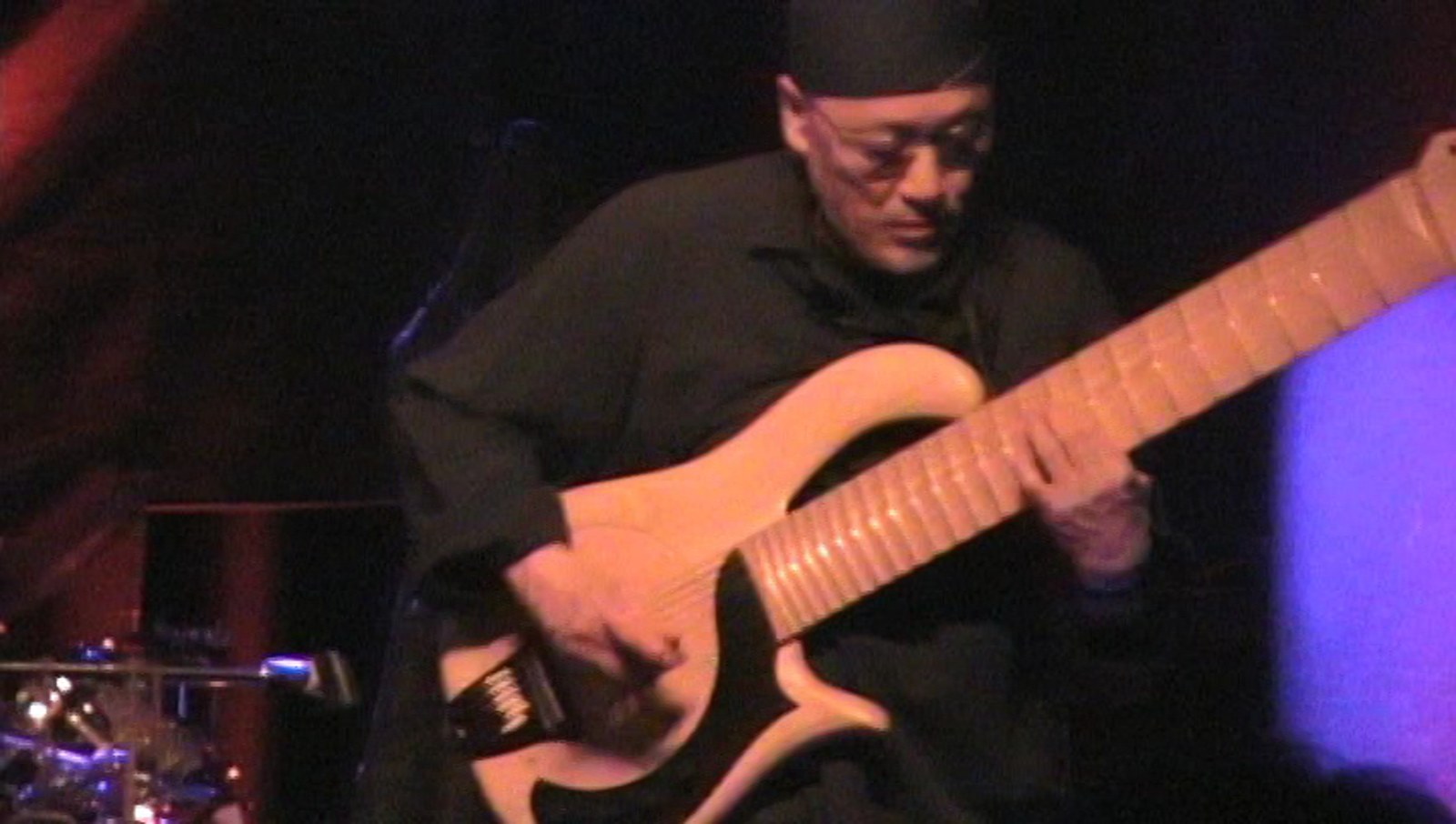 Hideki Ishima of Flower Travellin' Band playing his sitarla on stage in Brooklyn in 2008