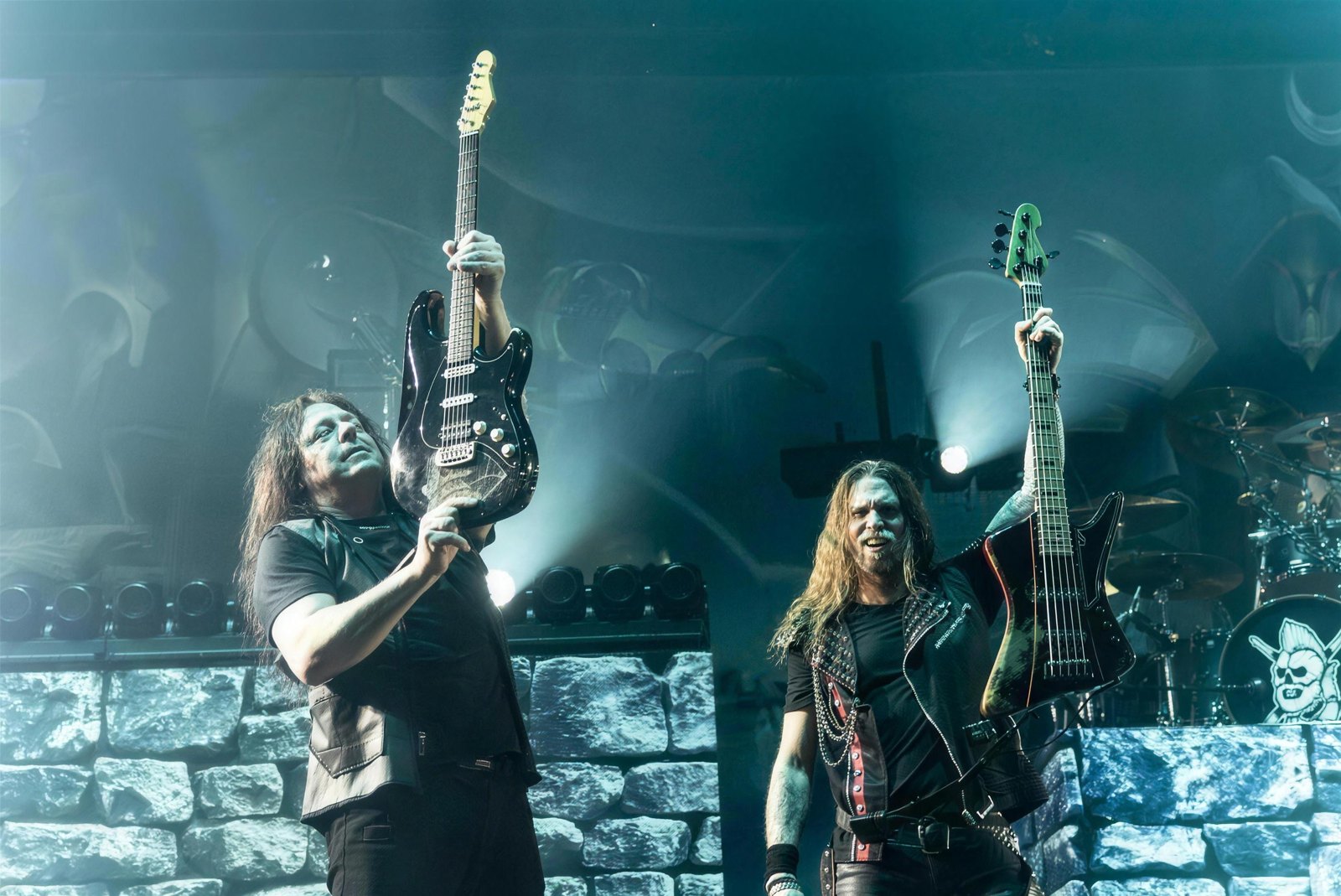 Oscar Dronjak and Fredrik Larsson of HammerFall raise their instruments on stage, OVO Arena Wembley, London, 7 March 2026