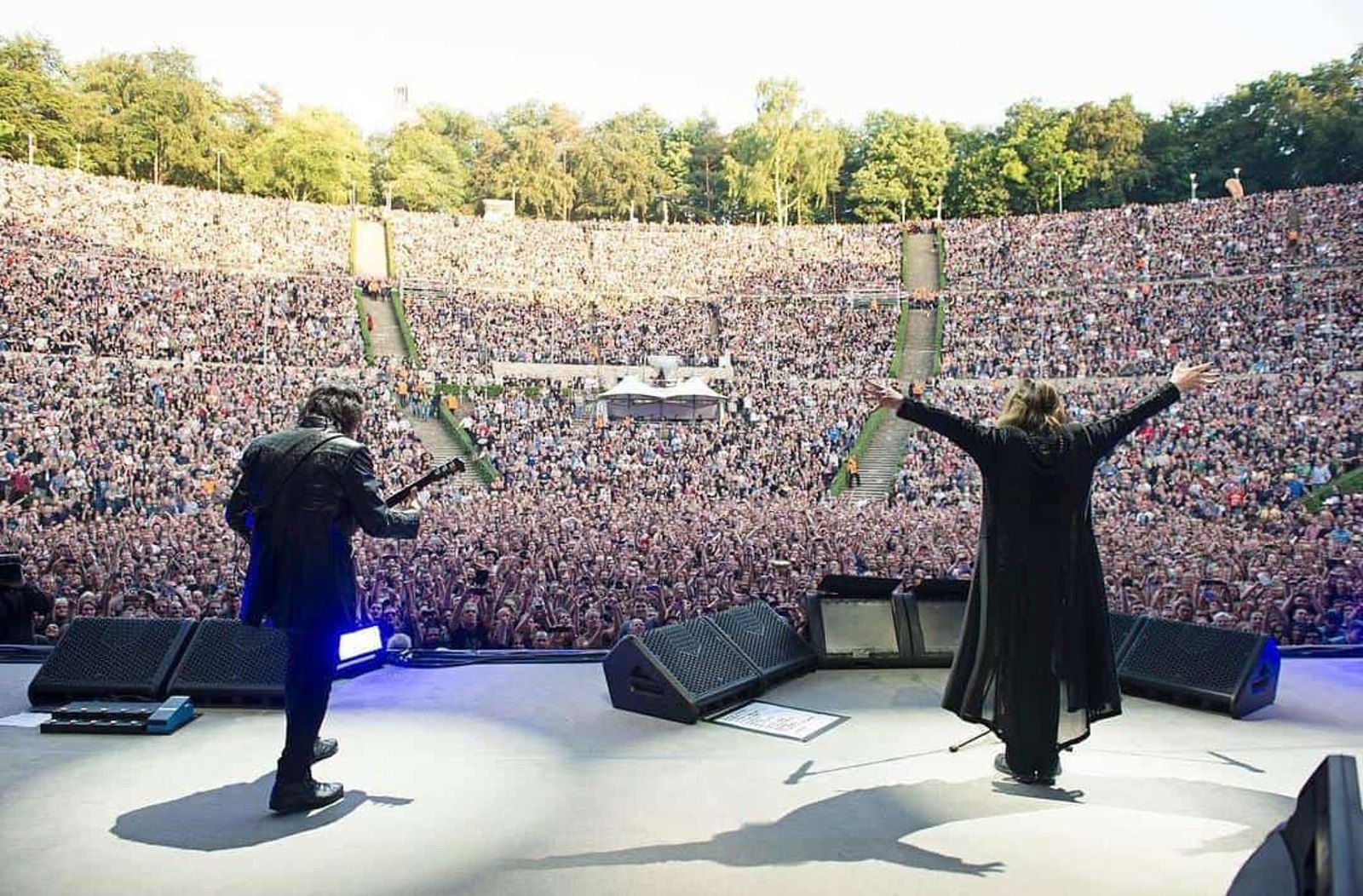 Tony Iommi and Ozzy Osbourne of Black Sabbath facing the crowd at the Waldbuhne, Berlin, on the band's farewell tour