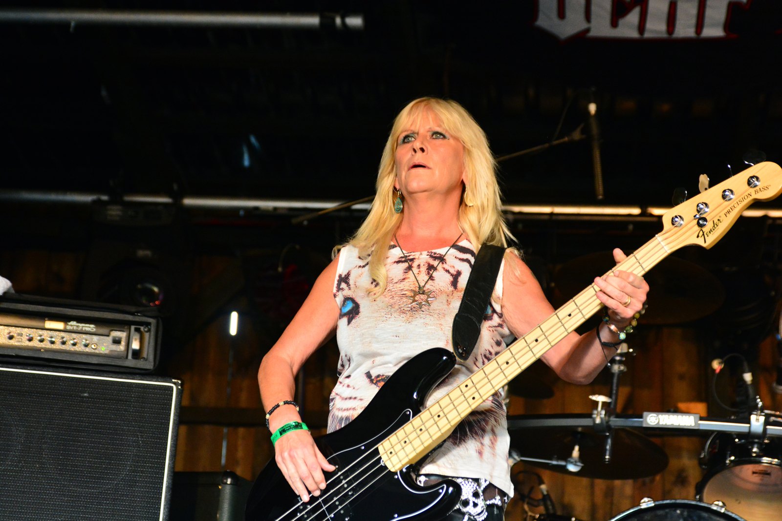 Jody Turner of Rock Goddess playing bass on stage at Headbangers Open Air in July 2015